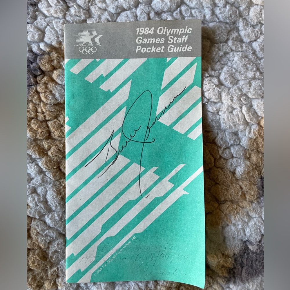 Bruce Jenner Autographed 1984 Olympics Pocket Guide.